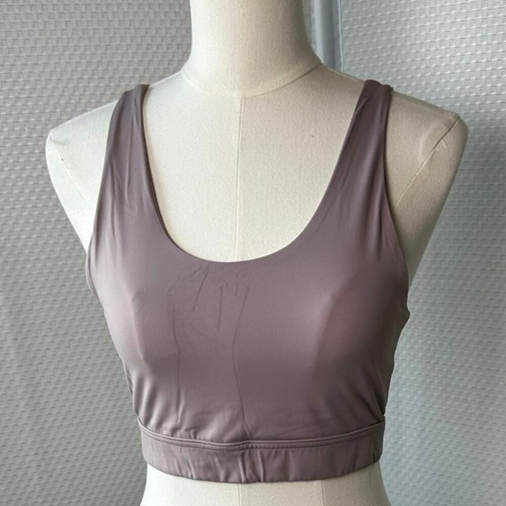 Luna razorback purple 
size Medium Sports Bra